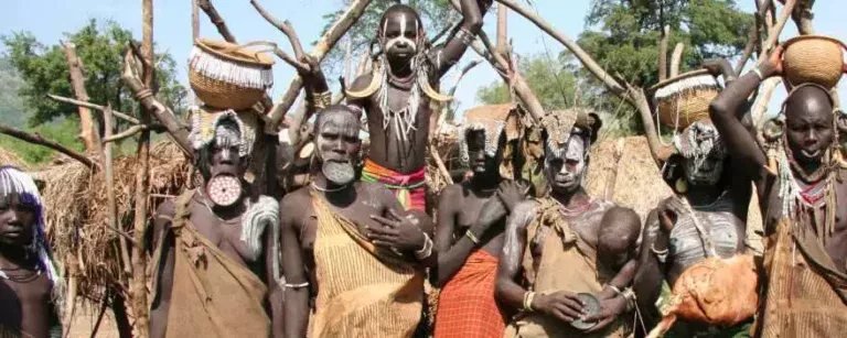 Mursi tribe lives in the Omo River Valley. Visiting them is part of a trip to Ethiopia.